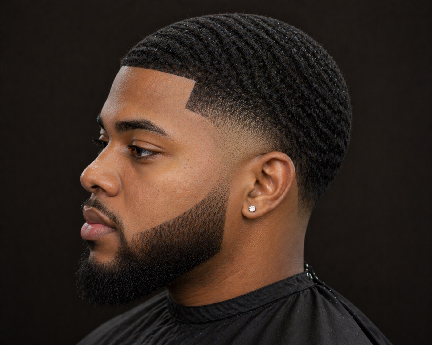 Waved Temple Taper With Beard Line — side profile barber reference photo showing the fade line and top shape
