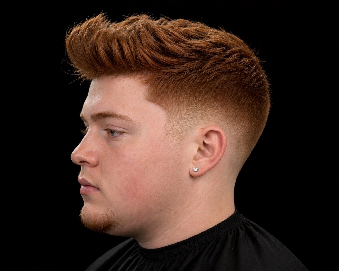 Combed Copper Quiff With Mid Skin Fade — side profile barber reference photo showing the fade line and top shape