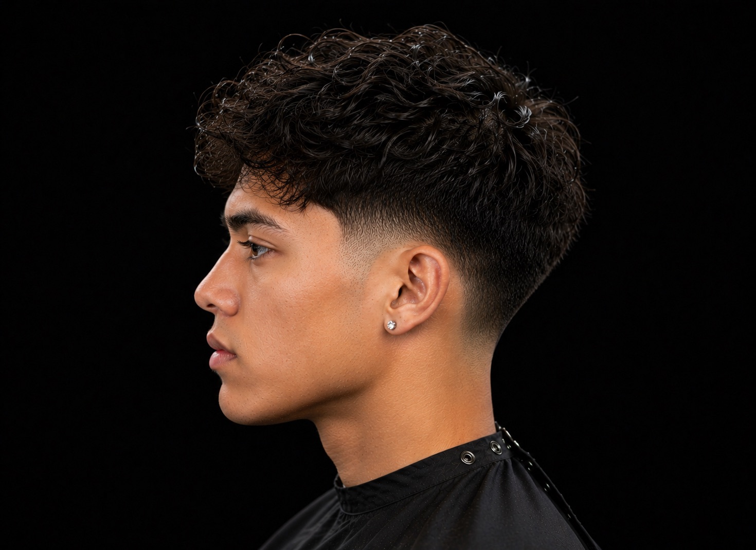 Loose Curl Drop Taper — side profile barber reference photo showing the fade line and top shape