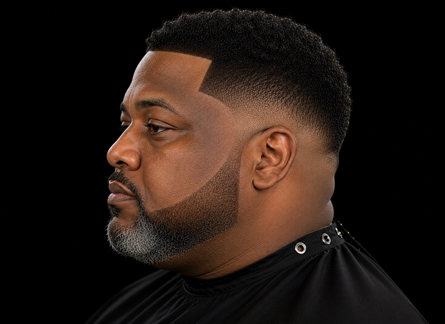 Mid Fade With Rounded Coil Cap — side profile barber reference photo showing the fade line and top shape