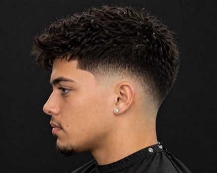 Mid Burst Fade With Piecey Curly Fringe — barber reference photo