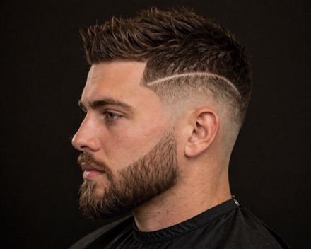 Mid Fade With Shaved Part And Spiked Top — barber reference photo
