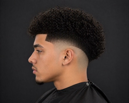 Low Drop Fade With Loose Curl Sponge Top — barber reference photo