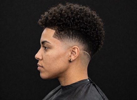 Rounded Curl Top With Burst Fade And Etched Arc — barber reference photo
